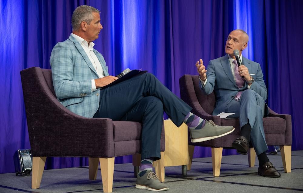 Big 12 Commissioner Brett Yormark (pictured right) and Mike Buddie, TCU director of intercollegiate athletics
